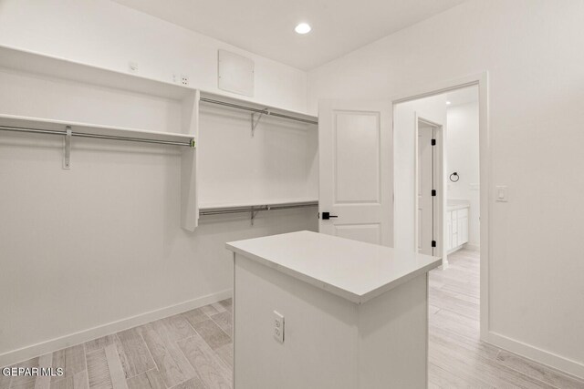 13397 Highworth Dr, El Paso, TX 79928 - spacious closet with light wood-style flooring