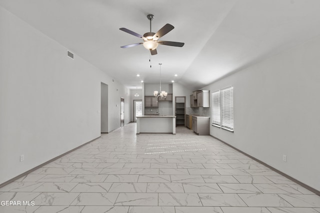 1229 Night Sky St, El Paso, TX 79928 - unfurnished living room featuring vaulted ceiling, a ceiling fan, a chandelier, light marble finish flooring, and baseboards