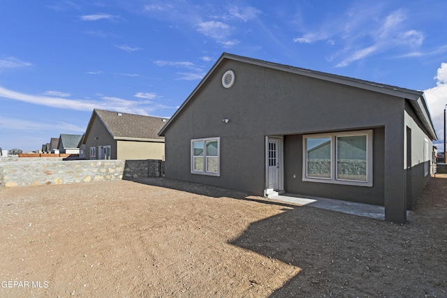 1229 Night Sky St, El Paso, TX 79928 - rear view of house featuring stucco siding