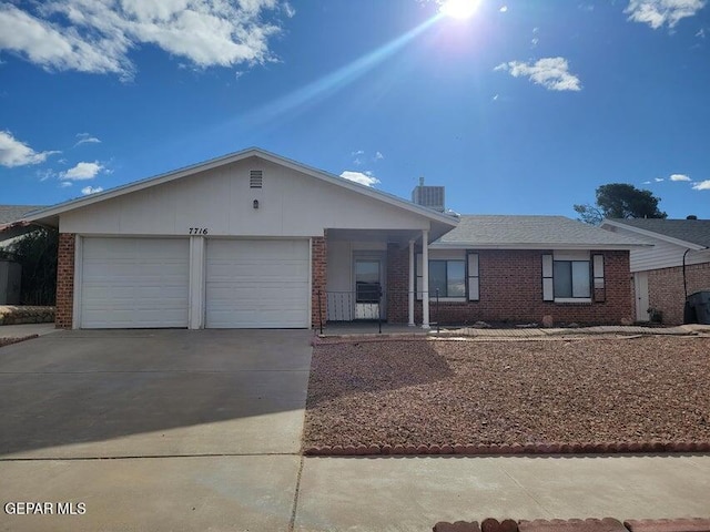 single story home with a garage