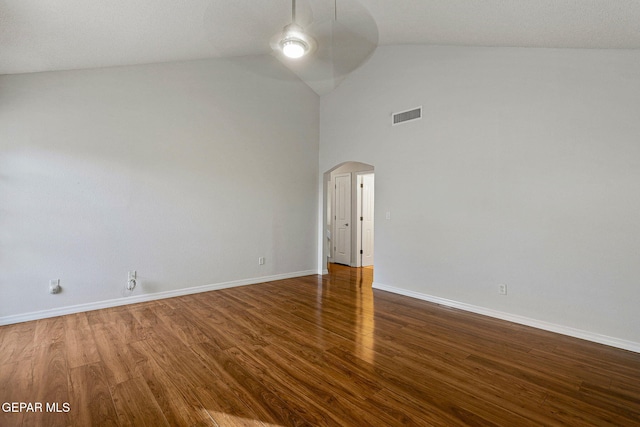 unfurnished room featuring high vaulted ceiling and wood-type flooring