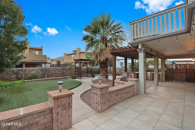 view of patio / terrace with a gazebo and a pergola