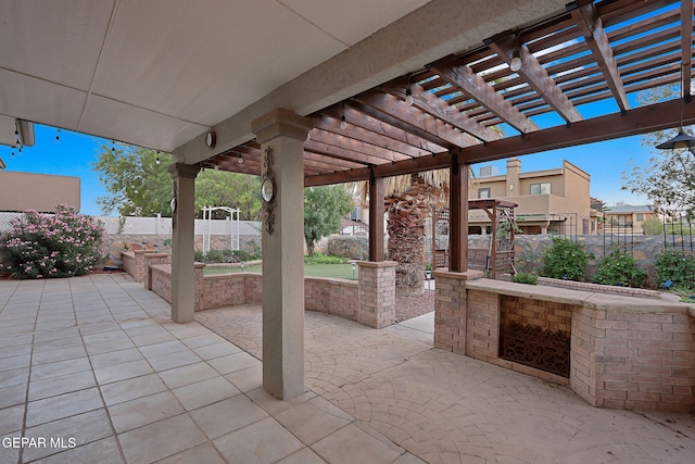 view of patio featuring a pergola