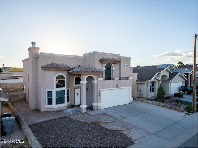 view of front of property with a garage