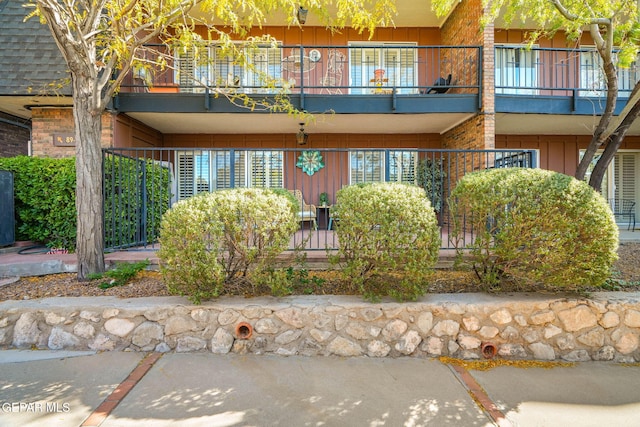 exterior space with a balcony