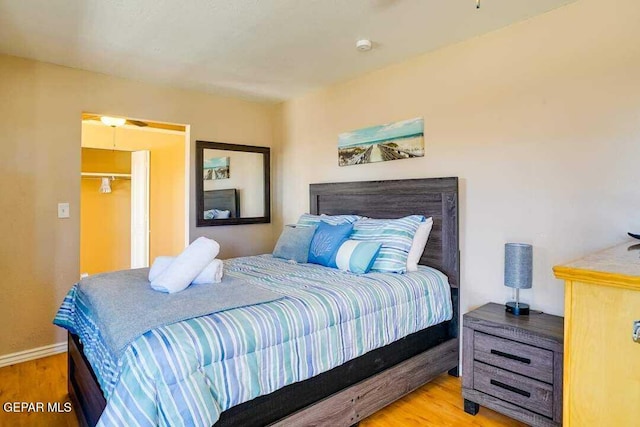 bedroom featuring wood-type flooring