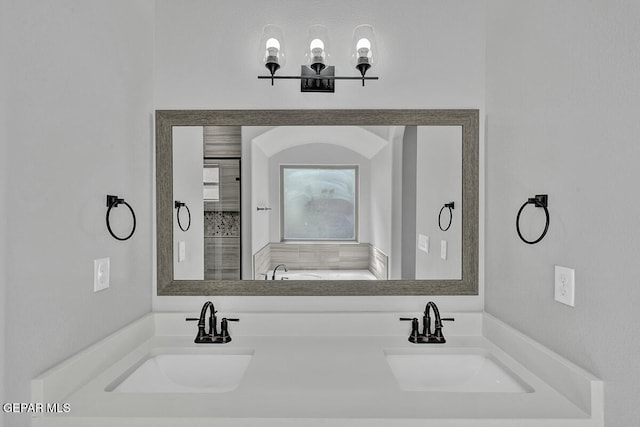 bathroom featuring vanity and a tub to relax in