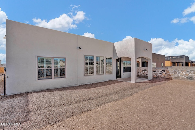 rear view of property with a patio