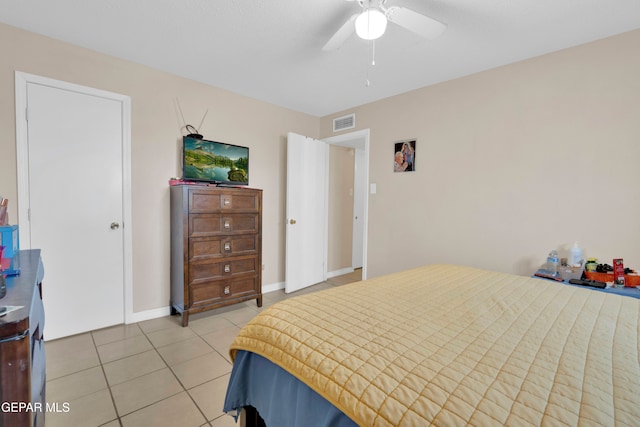 bedroom with light tile patterned floors and ceiling fan