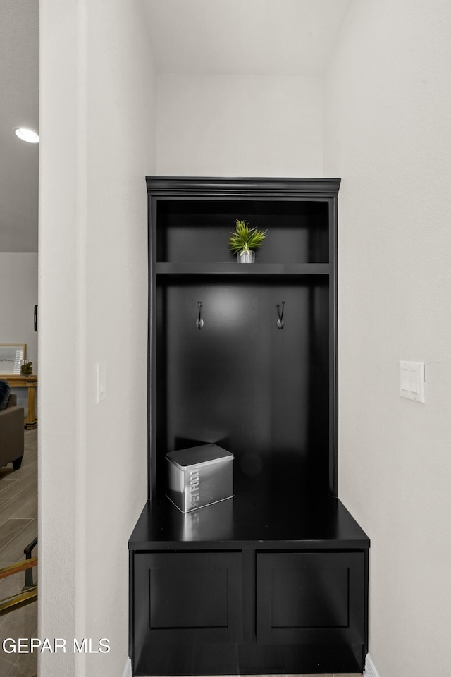 mudroom with hardwood / wood-style floors