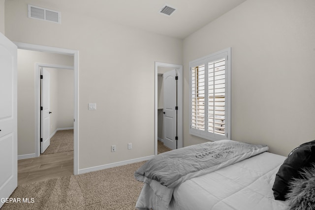 bedroom featuring light hardwood / wood-style flooring