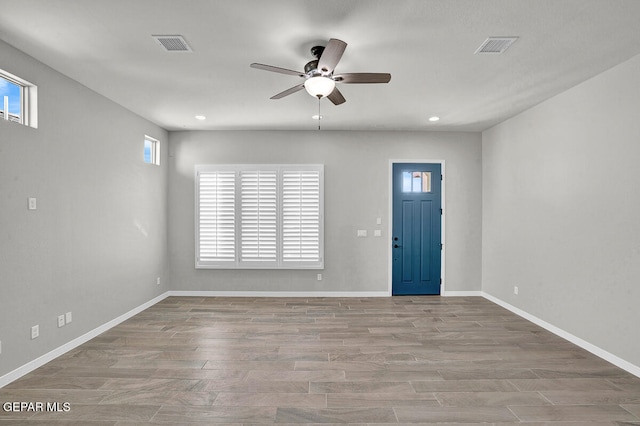 entrance foyer with hardwood / wood-style flooring and ceiling fan