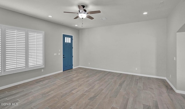 13653 Prime Vista Ct, El Paso, TX 79928 - unfurnished room with wood finished floors, a ceiling fan, and recessed lighting