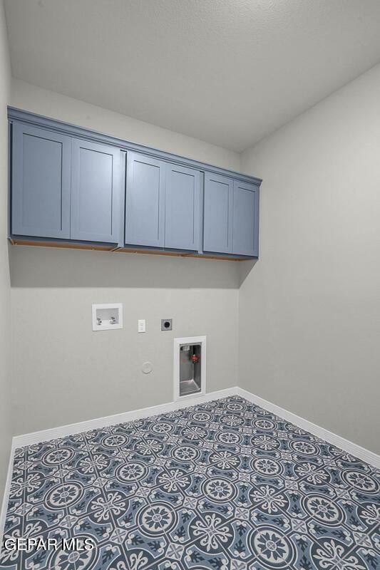 13653 Prime Vista Ct, El Paso, TX 79928 - laundry area featuring hookup for an electric dryer, washer hookup, cabinet space, and hookup for a gas dryer