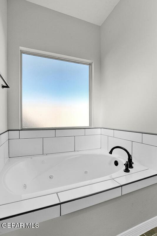 13653 Prime Vista Ct, El Paso, TX 79928 - full bathroom featuring healthy amount of natural light and a jetted tub