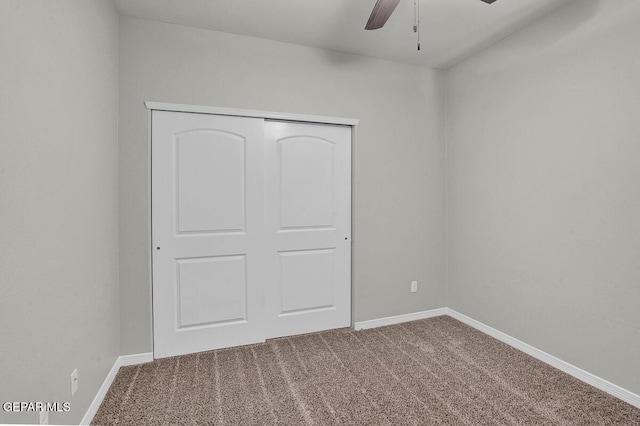 13653 Prime Vista Ct, El Paso, TX 79928 - unfurnished bedroom featuring carpet, a closet, and a ceiling fan