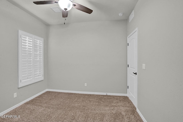carpeted empty room with ceiling fan