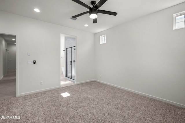 13866 Paseo Central Ave, El Paso, TX 79928 - unfurnished bedroom featuring light carpet, baseboards, recessed lighting, connected bathroom, and ceiling fan