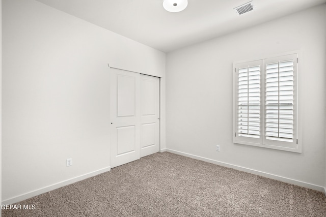 13866 Paseo Central Ave, El Paso, TX 79928 - unfurnished bedroom featuring carpet, baseboards, and a closet