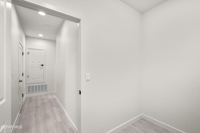 13866 Paseo Central Ave, El Paso, TX 79928 - hallway featuring light wood-type flooring, baseboards, and recessed lighting