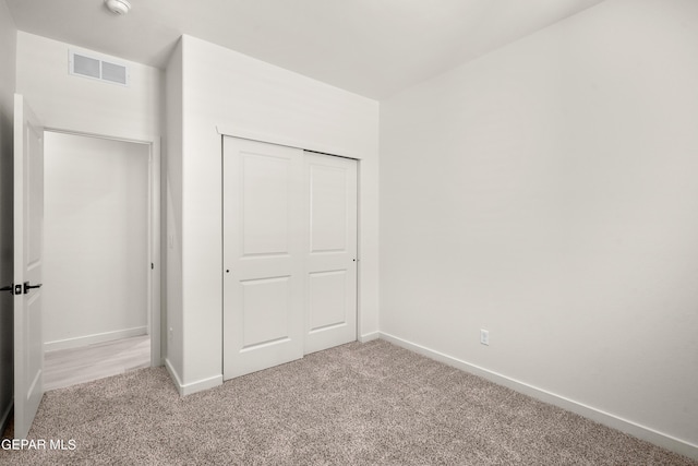 13866 Paseo Central Ave, El Paso, TX 79928 - unfurnished bedroom featuring carpet floors, baseboards, and a closet
