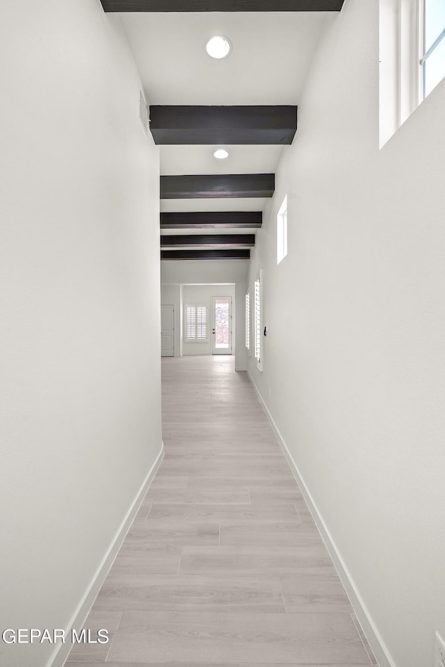 13866 Paseo Central Ave, El Paso, TX 79928 - hallway with baseboards, healthy amount of natural light, beamed ceiling, and recessed lighting