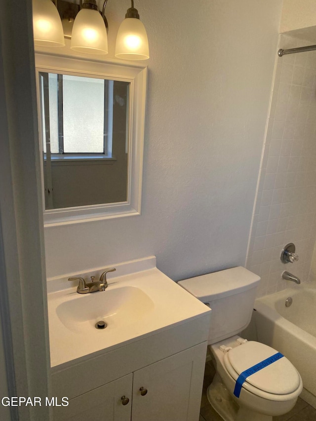 full bathroom with vanity, toilet, and tub / shower combination