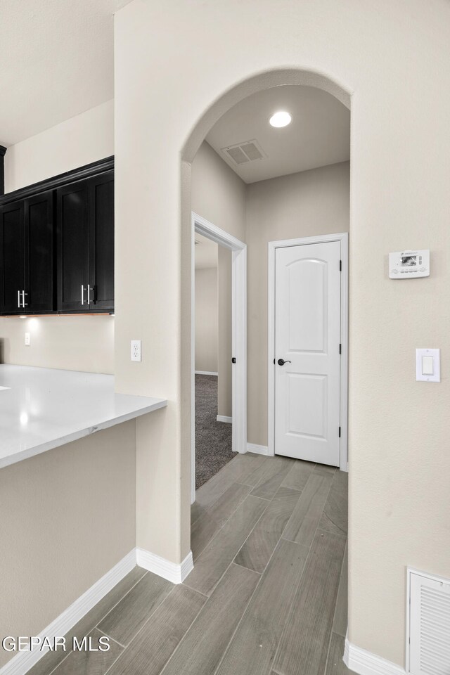 hallway with light wood-type flooring