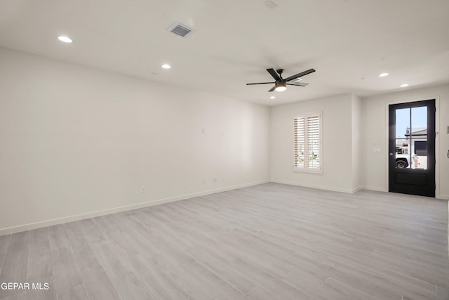 unfurnished room with light hardwood / wood-style floors and ceiling fan