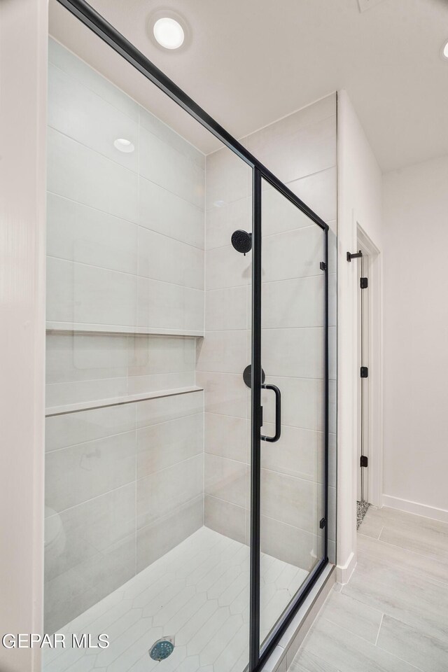 13870 Paseo Central Ave, Horizon City, TX 79928 - full bathroom with a shower stall, baseboards, and recessed lighting