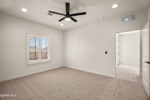 13870 Paseo Central Ave, Horizon City, TX 79928 - spare room featuring light carpet, ceiling fan, recessed lighting, and baseboards
