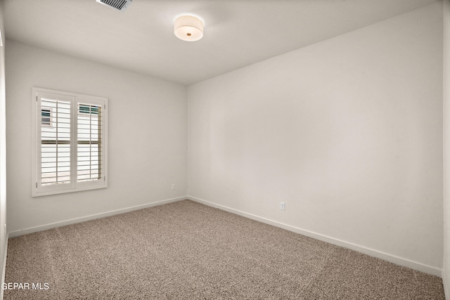 empty room featuring carpet floors