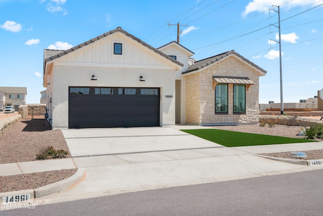 modern farmhouse with a garage