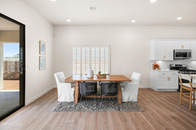 dining space featuring light hardwood / wood-style flooring