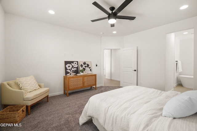 bedroom featuring ensuite bath, carpet floors, and ceiling fan