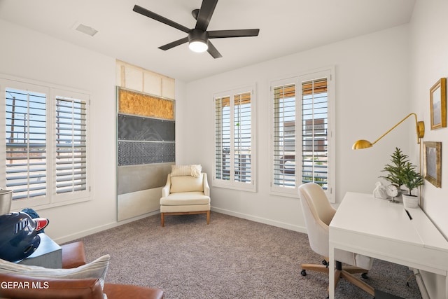 office space featuring ceiling fan and carpet flooring