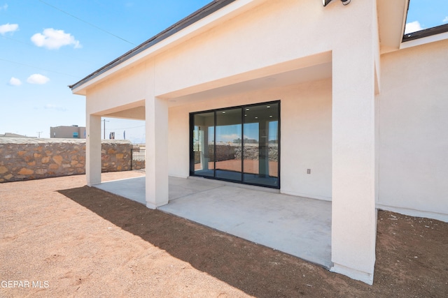 back of house featuring a patio area