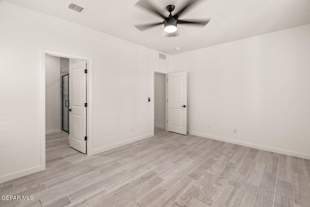 unfurnished bedroom featuring light wood-type flooring and ceiling fan