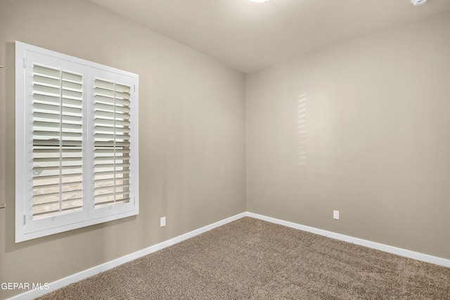 view of carpeted spare room