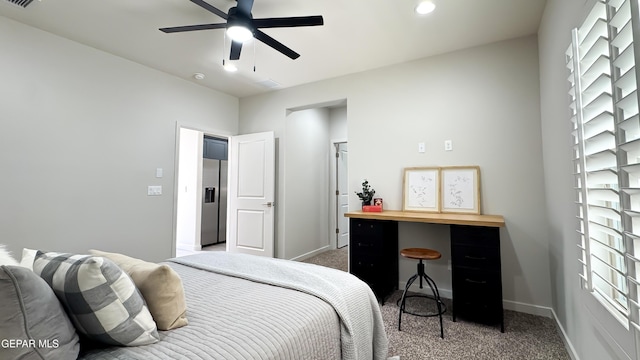 5848 Kobe Bryant St, El Paso, TX 79924 - bedroom featuring carpet, stainless steel fridge with ice dispenser, baseboards, and ceiling fan