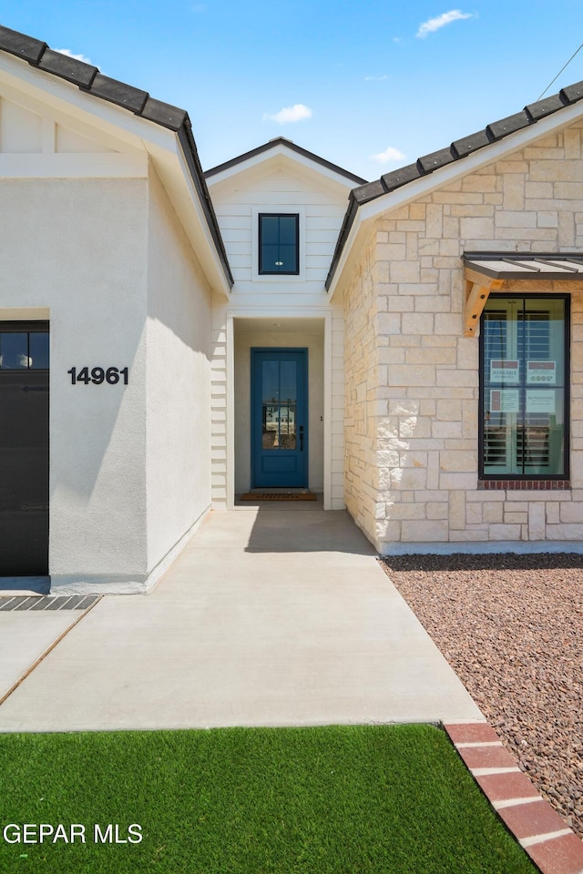 14956 Hill Ridge Ct, El Paso, TX 79938 - property entrance with stone siding