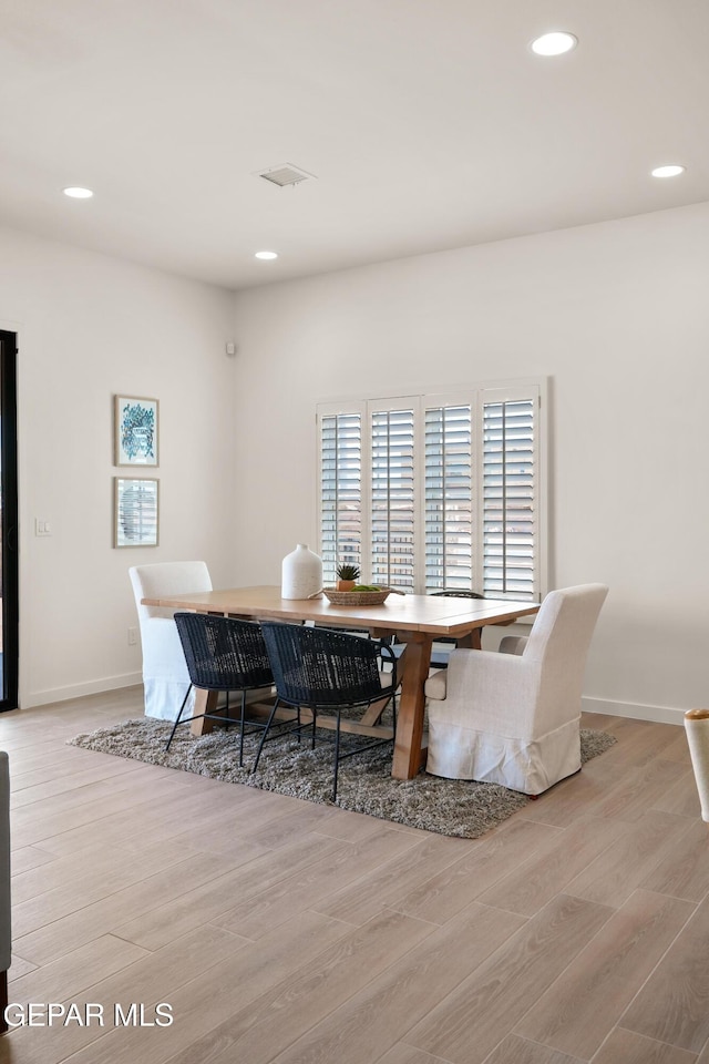 14956 Hill Ridge Ct, El Paso, TX 79938 - dining room featuring wood finished floors, recessed lighting, and baseboards