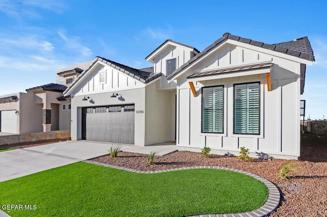 14952 Hill Ridge Ct, El Paso, TX 79938 - modern farmhouse style home with a garage, board and batten siding, concrete driveway, a front lawn, and a tile roof