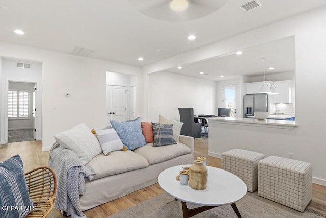 14952 Hill Ridge Ct, El Paso, TX 79938 - living area featuring ceiling fan, light wood finished floors, and recessed lighting