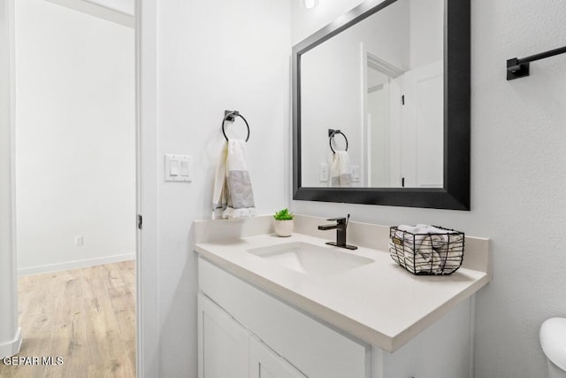 14952 Hill Ridge Ct, El Paso, TX 79938 - bathroom featuring vanity and wood finished floors