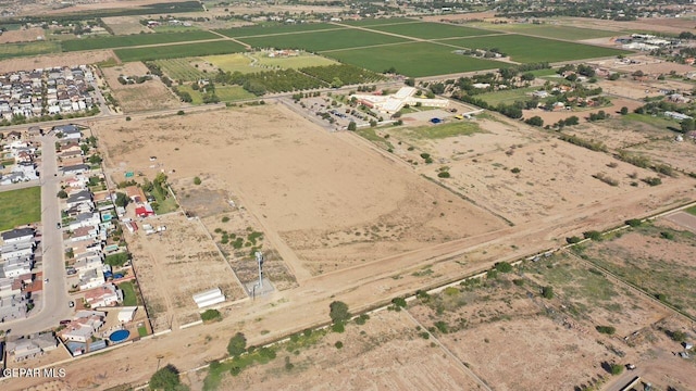 birds eye view of property featuring a rural view