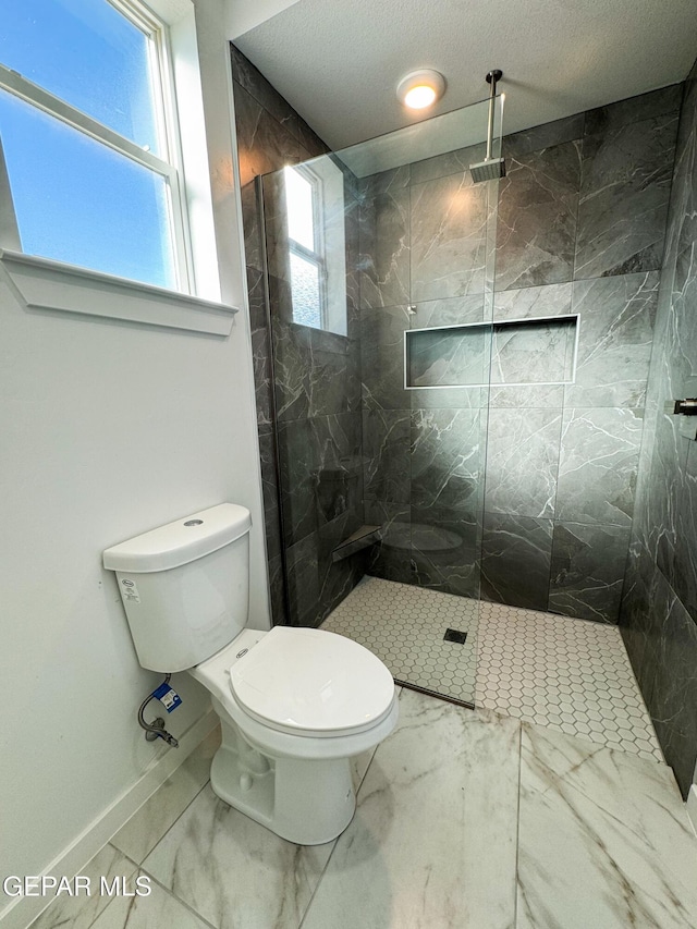 1783 Urijah Pl, El Paso, TX 79928 - bathroom with marble finish flooring, plenty of natural light, toilet, and a marble finish shower