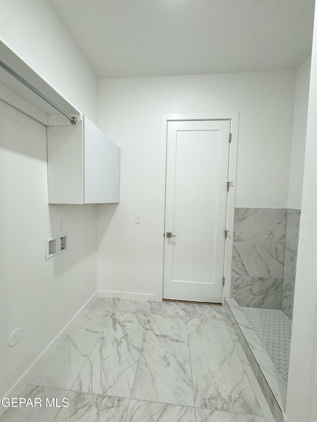 1783 Urijah Pl, El Paso, TX 79928 - washroom featuring light marble finish flooring, baseboards, washer hookup, and cabinet space