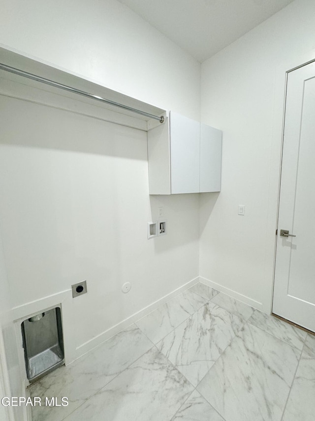 1783 Urijah Pl, El Paso, TX 79928 - laundry area featuring hookup for an electric dryer, gas dryer hookup, light marble finish flooring, baseboards, and hookup for a washing machine