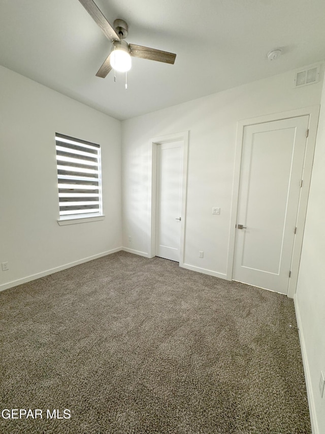 1783 Urijah Pl, El Paso, TX 79928 - unfurnished bedroom with carpet flooring, baseboards, and ceiling fan